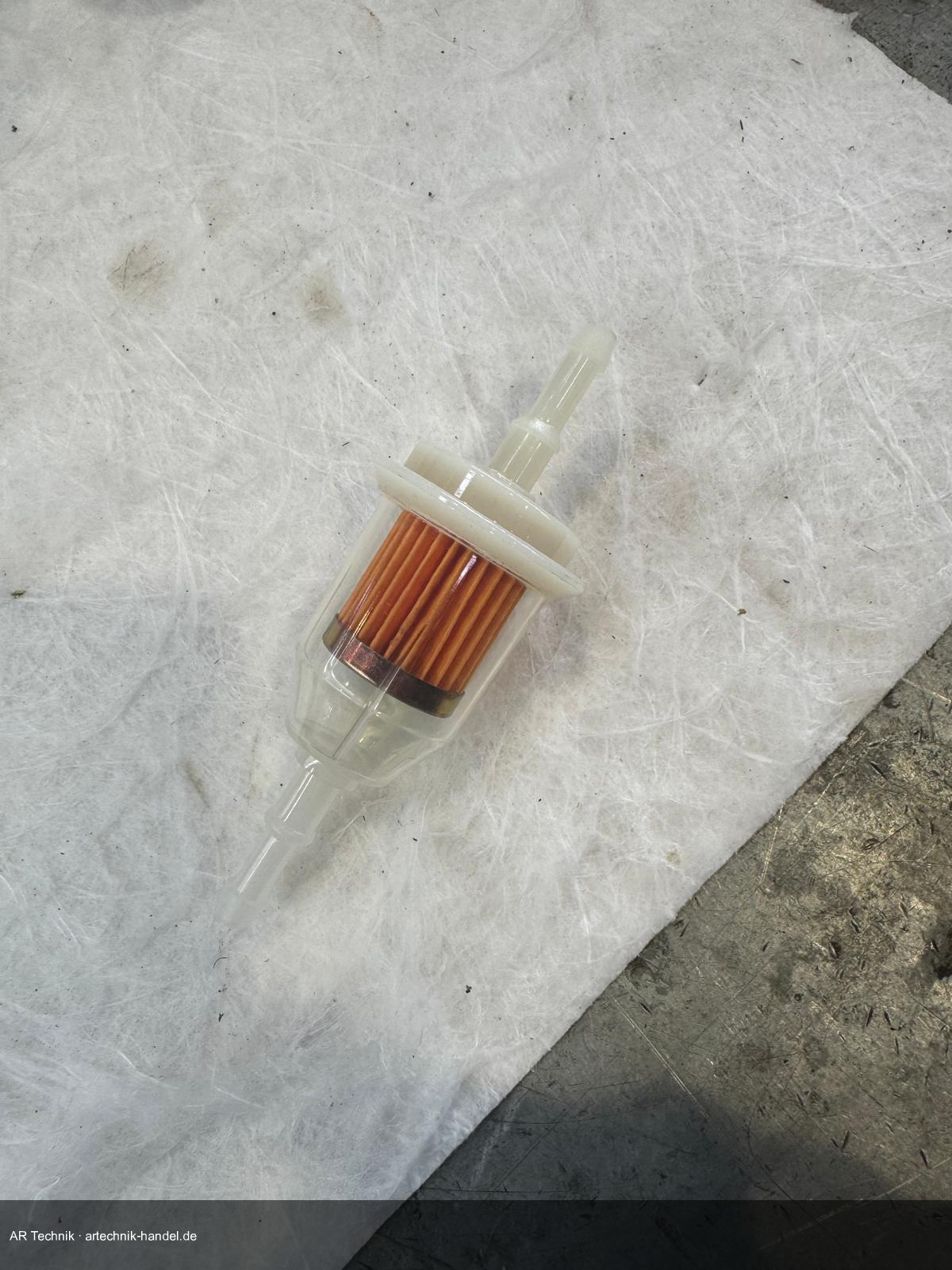 Neuer Leitungsfilter – transparent mit orangem Filterelement, passend für die Zulaufleitung